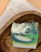 Load image into Gallery viewer, Ginkgo-Limette Soap in a olive wood soap disch.
