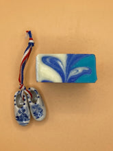 Load image into Gallery viewer, Gone to the beach soap by Soap Studio Fiori pictured from the top to depict the beautifully pattern on the top of the soap. This handmade soap is made from naturally occurring plant oils and is extra mild to your skin.  

