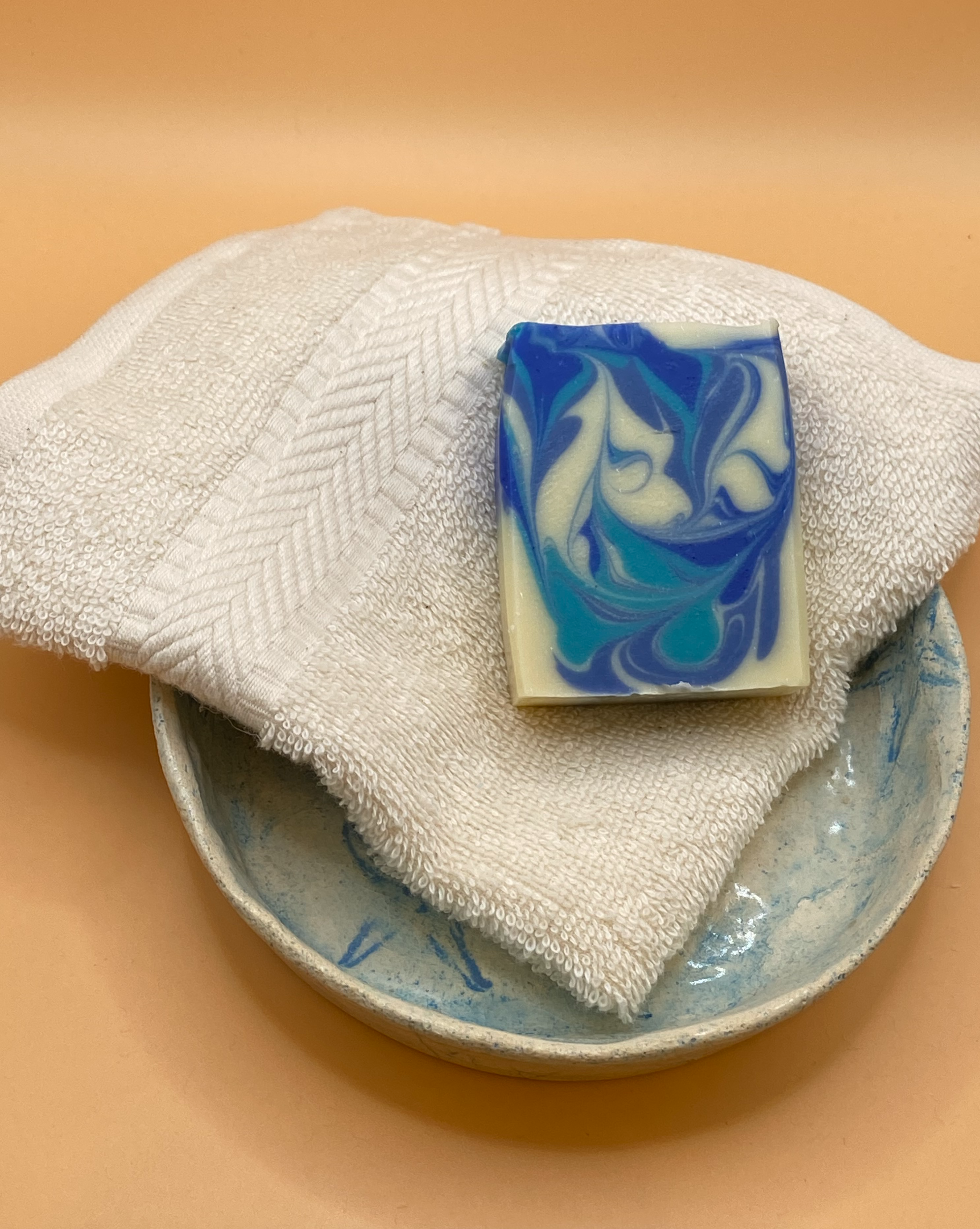 Face cloth with a soap